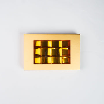 Boîte cadeau à bonbons chocolats dorée